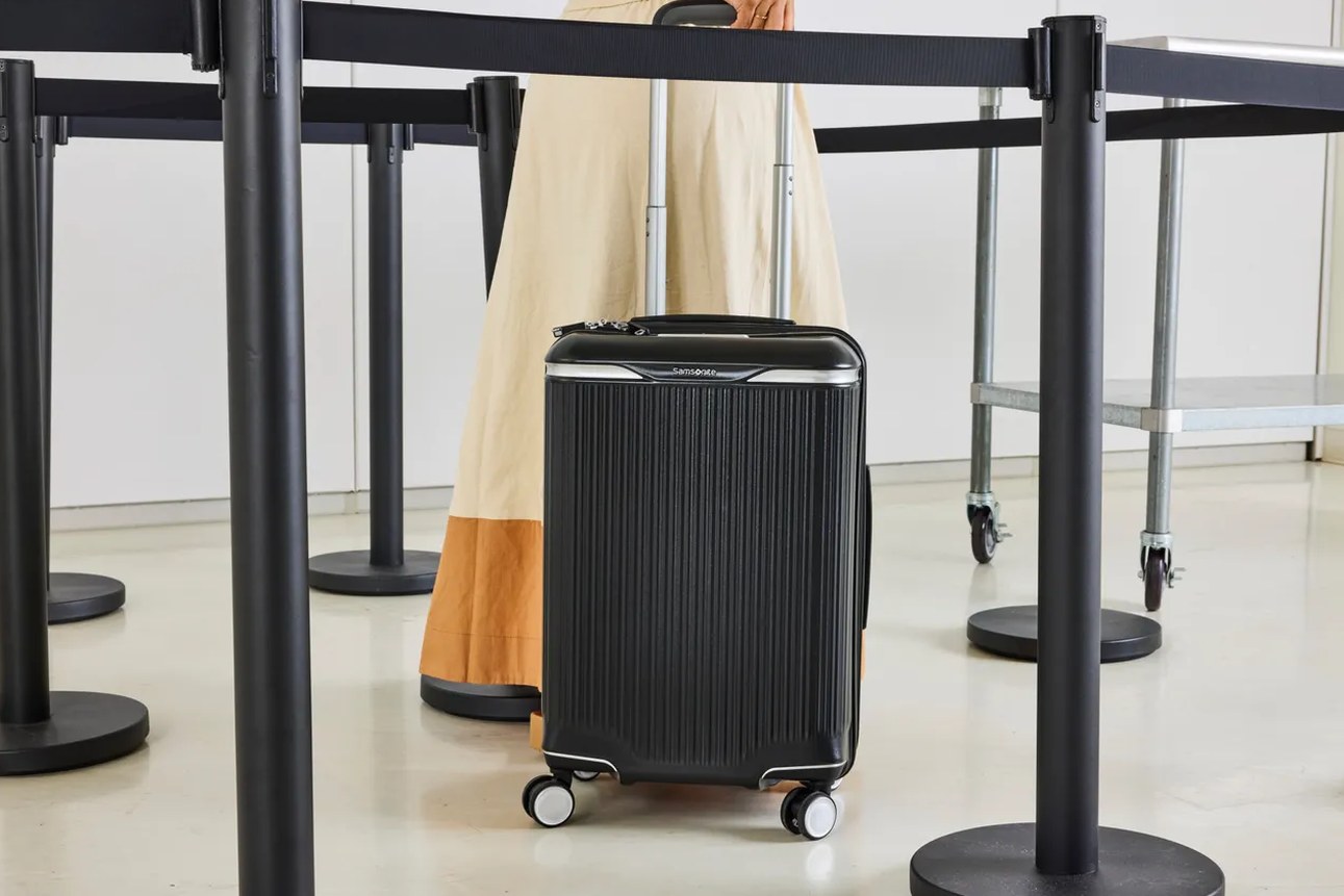Elegance Carry-On next to a sizer frame at a gate