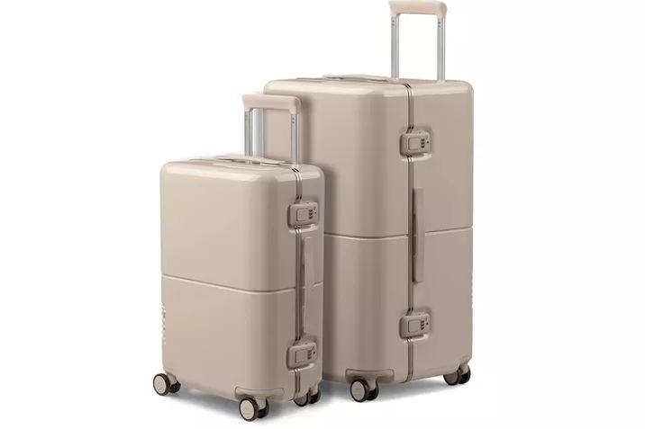 Level8 Carry On and Tumi carry-on side by side, handles extended