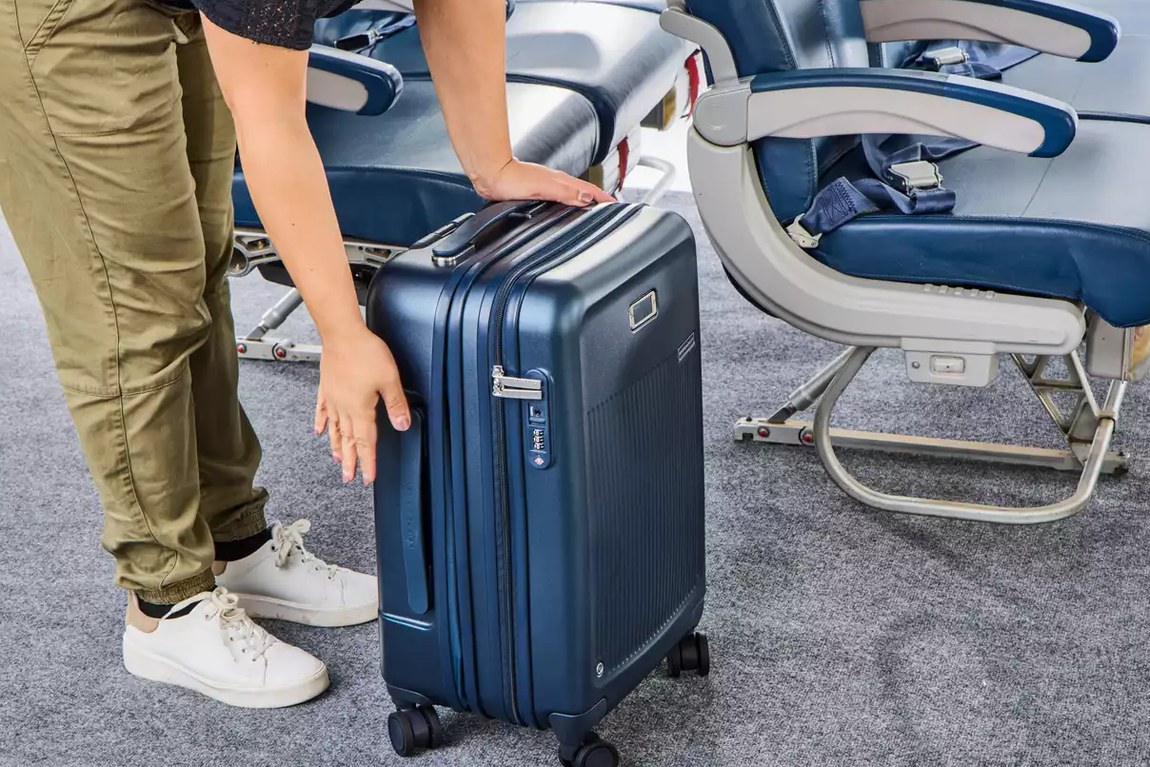 Pelican BA22 Elite standing next to a boarding gate size checker